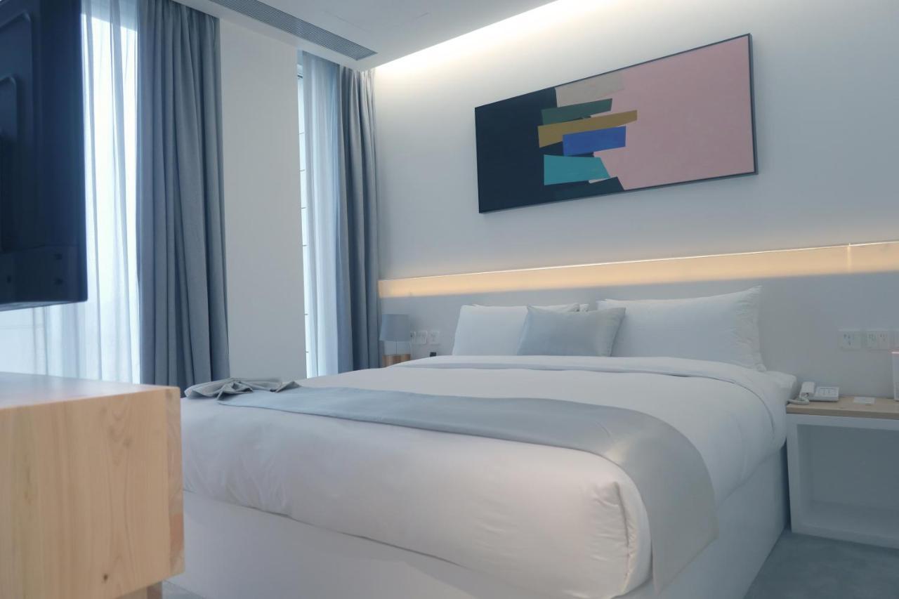 Jiaxing Goliah Hotel Bagian luar foto