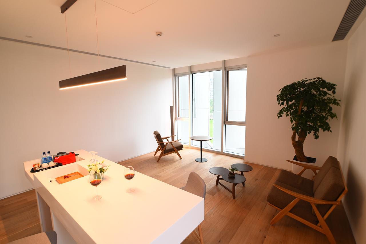 Jiaxing Goliah Hotel Bagian luar foto