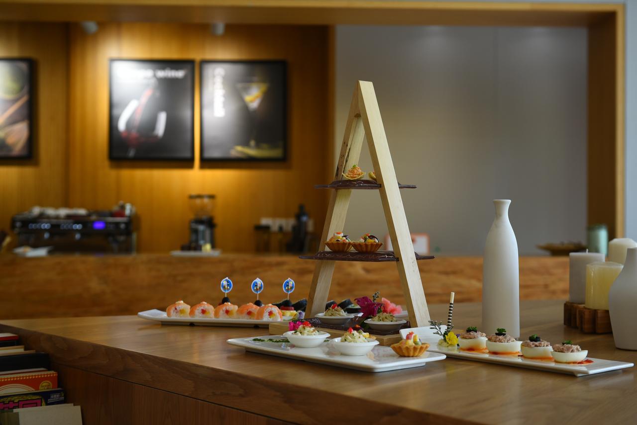 Jiaxing Goliah Hotel Bagian luar foto