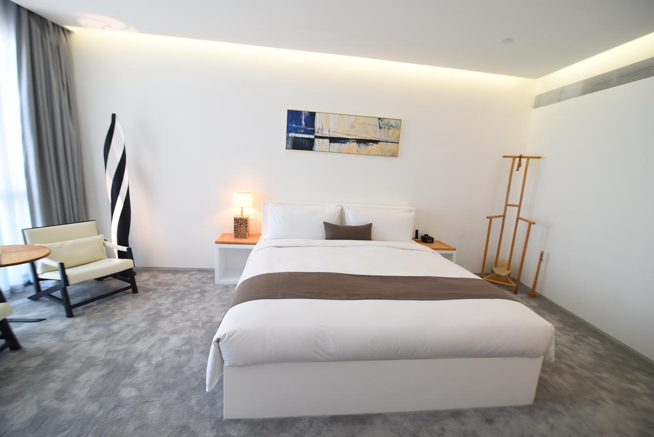 Jiaxing Goliah Hotel Bagian luar foto
