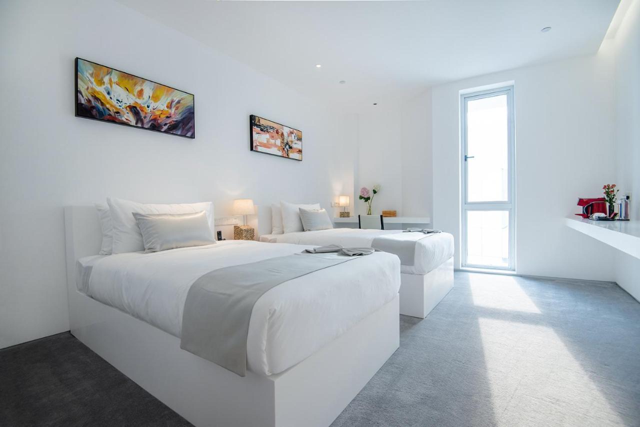 Jiaxing Goliah Hotel Bagian luar foto