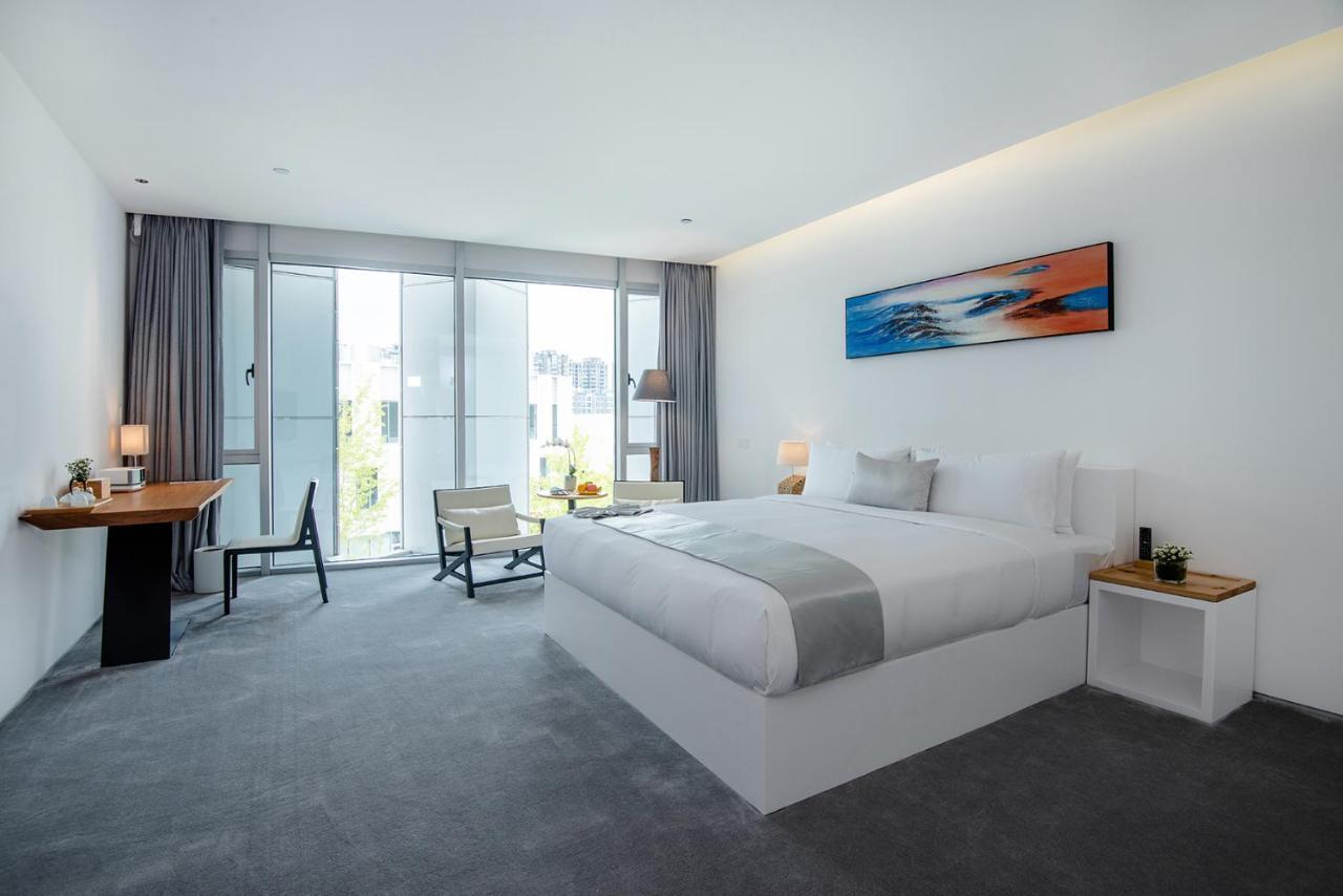 Jiaxing Goliah Hotel Bagian luar foto